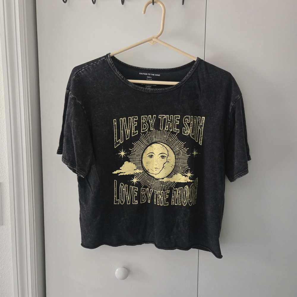 Caution To The Wind Black Graphic Tee with Gold Sun Moon Print